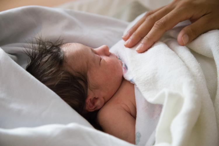 Baby and mother's hand